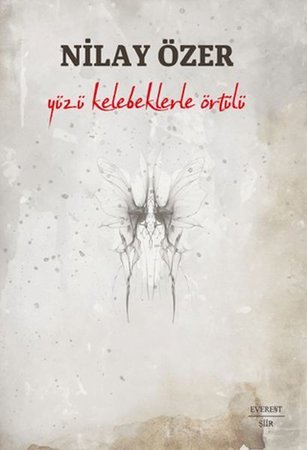 Yüzü Kelebeklerle Örtülü